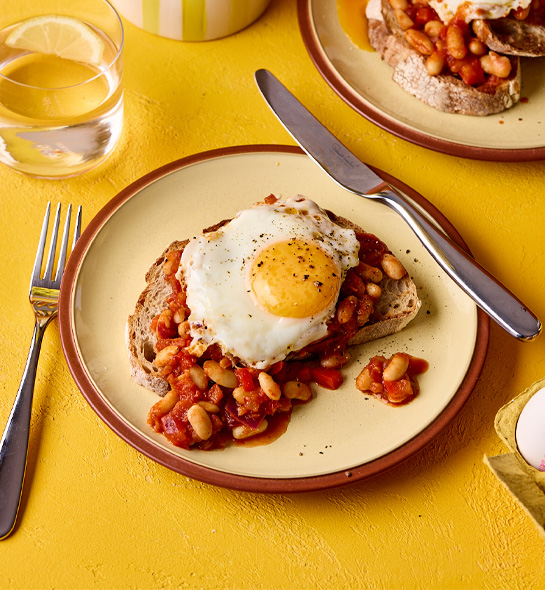 Smokey beans on toast with a fried egg
