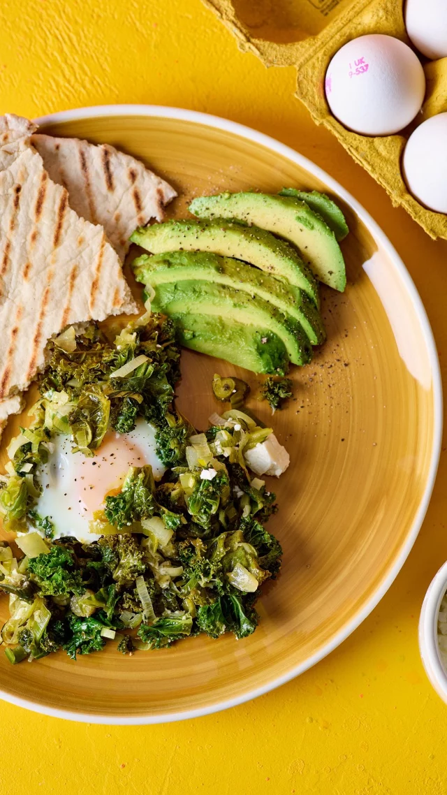 Jolly Green Giant Shakshuka 💚
A twist on the brunch classic that the jolly giant would be proud of! This green shakshuka is packed full of super nutritious veggies, pesto and perfectly poached eggs, and can be whipped up in only 15 minutes - perfect for those weekends when your kids come in hungry after practice!

15 mins | Serves 4

Ingredients:
1 tbsp rapeseed oil
1 onion, diced
1 large garlic clove, crushed
Sea salt & cracked black pepper
250g leek, finely sliced
200g kale, stalks removed
120g courgette, grated
1 - 2 tbsp green pesto
20g dill, finely chopped
10g gherkins or cornichons, roughly chopped
1 tbsp capers, roughly chopped
4 FREE eggs
50g feta, crumbled

Method:

1. Heat the oil in a large frying pan. Fry the onion for 2 - 3 minutes until softened. Add garlic, a pinch of salt and fry for 1 minute.
2. Fry leek, kale and courgette for 3 - 4 minutes until softened and any liquid evaporates. Stir through pesto until all vegetables are coated.
3. Sprinkle in dill, gherkins and capers and stir. Make 4 wells in the vegetables, crack in the eggs. Place on the lid, lower the heat, allow the eggs to cook for 3 - 4 minutes until the whites have just set and the yolk is still runny.
4.Remove pan from the heat. Crumble over the feta. Season with black pepper. Serve with avocado slices, chilli sauce and flatbreads.

One egg-cellent brunch, coming up!