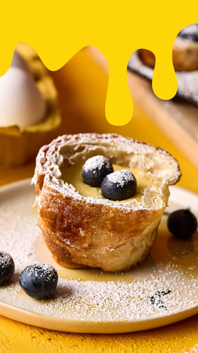 An eggciting way of using up any leftover croissants from yesterday’s breakfast, these sweet homemade custard tarts are an easy addition to your pastry plate when brunching over the weekend.

These tarts would also taste absolutely yummy if a little lemon curd was added in the base of the tart case, so if you fancy it, pop a teaspoon of curd into the cooked cases before spooning in the custard.

Ingredients

3 croissants
2 large FREE free range eggs
2 large FREE free range egg yolks
100g caster sugar
1 tbsp cornflour
1 tsp vanilla paste
300ml double cream
300ml milk
Fresh fruit, raspberries & blueberries (to serve)
Icing sugar (to serve)

Method

Preheat the oven to 200C/180C fan/gas 6.

Slice the croissants in half, turn on their ends and gently press into the muffin tin create tart cases. Be careful to not create any holes in the croissants otherwise your custard will leak out.

Bake in the oven for 4 - 5 minutes just until they have crisped up. In the meantime, make the custard.

In a large heatproof bowl crack in the eggs and add the yolks along with the sugar, cornflour and vanilla. Whisk together to combine. Pour the cream and milk in a heavy-bottomed pan and gently heat over a low heat just until warm.

Pour the warmed milk into the egg yolk mixture slowly, whilst whisking continuously to ensure you do not scramble the eggs.

Return the custard mixture back to the pan and place over a medium heat, stirring continuously. Allow the custard to cook for 5 - 7 minutes until it becomes thick.

Pour the custard into a jug for easy pouring. Carefully pour the custard into the prepared croissant cases before placing in the fridge for at least 30 minutes (but ideally 1 hour) to cool and set.

Remove from the fridge once set, finish with fresh fruit and a sprinkling of icing sugar if desired.