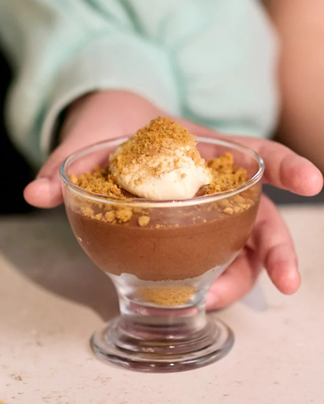 Whether your favourite biccies are hobnobs, Oreo’s, ginger nuts or anything in-between, we guarantee they’ll taste GREAT with these easy peasy chocolate mousses!

Save this recipe ☝️ and enjoy getting the kids in the kitchen during the summer hols to whip up these yummy desserts together.

For a fun afternoon with the littles, you’ll need:

180g dark chocolate
50g salted butter, cubed
4 FREE egg whites
3 tbsp caster sugar
Pinch of salt
60g ginger biscuit
100ml double cream

Break up the chocolate into a heat-proof bowl and add the butter. Melt in the microwave in 30 second intervals or over a pan of simmering water. Stir to combine then remove from the heat to cool slightly.

Add the egg whites to a clean bowl and sprinkle in the sugar. Using a balloon or electric hand whisk, whisk the egg whites to soft peaks.

Add a spoon of the melted chocolate into the whipped eggs, folding gently to incorporate before adding all the whipped egg mixture into the melted chocolate.

Using a metal spoon, in a cutting and folding motion, gently combine the egg mixture through the chocolate trying to maintain as much as in the mixture as possible.

Crush the biscuits using the end of a rolling pin or blitz in a food processor to rough crumbs. Sprinkle 2/3 biscuit crumb into the base of the ramekins or dessert glasses before carefully spooning over the chocolate mousse mixture.

Place the mousses in the fridge to set for at least 2 hours. When ready to serve, whisk the double cream to soft peaks. Remove the set mousses from the fridge and spoon over the whipped cream. Sprinkle over the remaining biscuit crumb to finish.