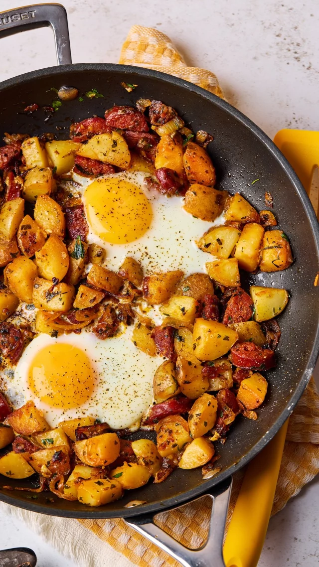 This tasty brunch dish is perfect for the family this weekend, packed full of flavour and so simple to make. 

Just set aside some cooked potatoes from the previous night’s dinner, grab a few kitchen staples (including a couple of large FREE eggs) and you can rustle it up in 15 minutes flat. If the kids are feeling adventurous, it’s great with sweet potatoes too!

Prep: 5 mins | Cook: 15 mins

Serves 2 people

Ingredients:

1 tbsp salted butter
1 tbsp oil
1 onion, sliced
1 garlic clove, crushed
150g chorizo, chopped
10g flatleaf parsley
400g cooked potato
Sea salt and cracked black pepper
2 large FREE eggs
FOR THE PAPRIKA MAYO
50g mayonnaise or garlic mayonnaise
1 tsp sweet smoked paprika
Squeezed lemon juice

Method:

Melt the butter and warm the oil in a large frying pan over a medium to high heat. Add the sliced onion and garlic to the pan and fry for 3 - 4 minutes until the onions begin to soften.
Add the chopped chorizo to the pan and fry for a further 2 minutes until it starts to release its oils.

Finely dice the stalks of the parsley (keeping the leaves for later) and sprinkle into the pan, stirring well to combine all the ingredients. Roughly chop the potatoes into small cubes and add to the chorizo.

Allow the potato to take on the colour of the chorizo oil and start to crisp on the edges. Try to avoid stirring too much as you want the chorizo and potato to start to caramelise but, equally, don’t let it burn and stick to the pan. This will take approximately 5 minutes.

When the potato is starting to colour, turn down the heat to low-medium and make 2 large wells in the mixture. Crack an egg into each well before placing on the lid and allow it to fry for 3 - 4 minutes until the egg whites have set but the yolk is still soft.

In the meantime, make the paprika mayo by combining the mayonnaise and paprika in a bowl and adding a squeeze of lemon juice. Stir well to combine and set aside until ready to serve.

Once the eggs have set, remove the pan from the heat. Roughly chop the parsley and sprinkle generously over the whole pan. Serve straight to the table alongside the prepared paprika mayo.