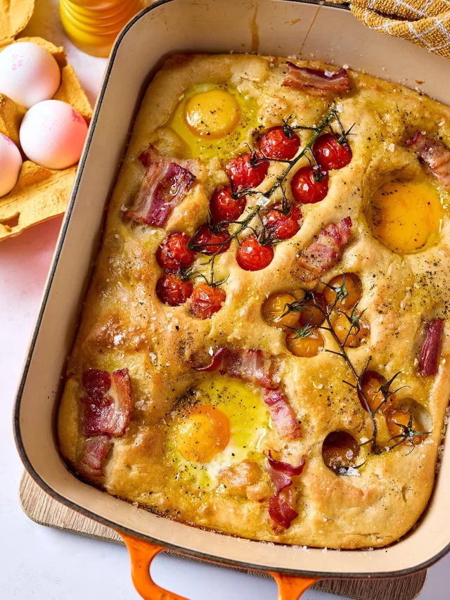 No more early morning rush... just long, lazy breakfasts and plenty of family time.

Start the holidays the delicious way with our baked focaccia, topped with juicy tomatoes, crisoy bacon, fragrant rosemary and perfectly baked FREE eggs. It’s simple to make, packed with goodness and guaranteed to keep hungry tummies full before a day of adventures.

Whether you’re heading to the beach, the park or simply enjoying time together at home, this is the perfect way to kick off the summer holidays.

Follow the easy yummy recipe below

Ingredients:
For the dough
500g strong bread flour
7g fast action yeast
Sea salt
2 tablespoons rapeseed oil, plus extra for greasing and drizzling
400ml lukewarm water

For the toppings: 
1 pack vine tomatoes, approx 300g
150g streaky bacon roughly chopped
1 sprig rosemary, roughly chopped
3 FREE Eggs

You will need:
Large baking dish or high-sided roasting tin

Method:

Place the flour, yeast, a generous pinch of salt and the oil in the bowl of a food mixer with the dough hook attached. Pour in the water and set the mixer to low to bring the ingredients together. Once a rough dough starts to come together, turn up the speed to medium and knead for 5-8 minutes until an elastic, smooth dough forms.

Place the dough in a lightly-oiled bowl and cover with a clean tea towel – allow to prove for 1 hour until the dough has doubled in size.

Turn the proved dough out on a clean surface and knock out all the air. Stretch and manipulate the dough to the size and shape of the baking dish. Lightly oil the inside of the dish before carefully placing in the stretched dough. Cover the dish and allow to prove for a further 35-40 minutes.

Preheat the oven to 220ºC/200ºC fan.

Uncover the proved dough and using clean, oiled fingers, make dimples and divots in the dough. Place on the vine tomatoes, leaving room for the eggs. Sprinkle over the bacon pieces along with the rosemary. Bake in the oven for 12 minutes.

Remove the partially baked focaccia from the oven, and working quickly, use the base of a glass or jar to create divots for the eggs. Carefully crack the eggs into the holes and return to the oven for a final 8 minutes.

Remove the focaccia from